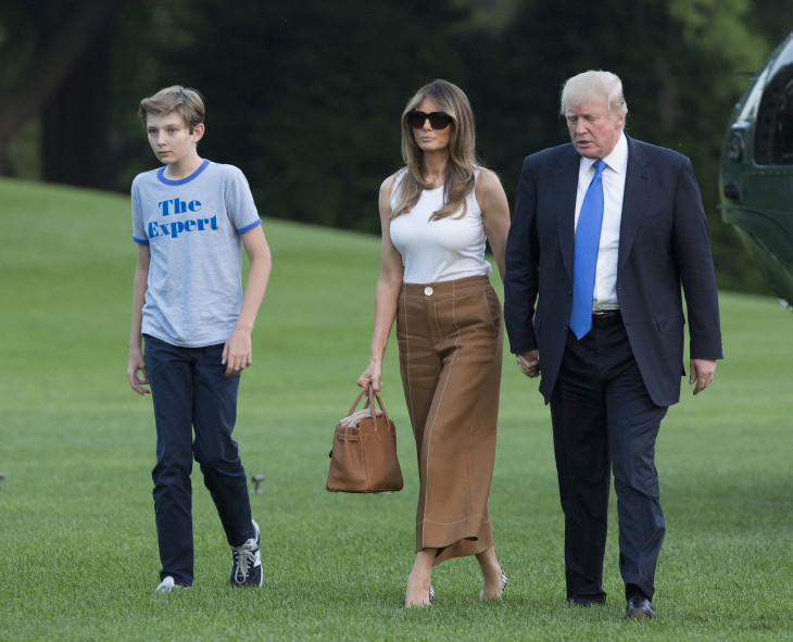 Мелания и Дональд Трамп с сыном в Вашингтоне