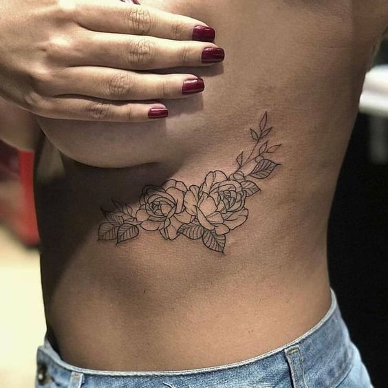 Татуировки возле груди